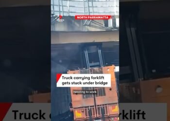 Truck sporting forklift will get caught underneath bridge at North Parramatta