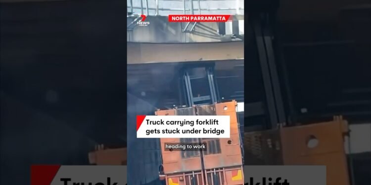 Truck sporting forklift will get caught underneath bridge at North Parramatta