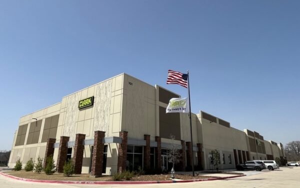 Clark returns headquarters to USA