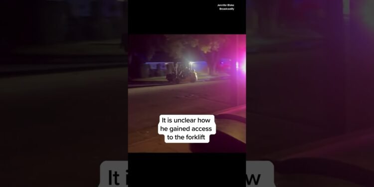 Guy riding forklift leads officials on a slow-speed chase